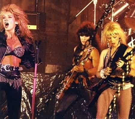 Emi Canyn with her band members performing live in stage